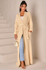 Beige long cardigan with tie belt and shawl collar