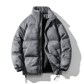 Short puffer jacket with stand-up collar and drawstring at the hem