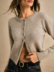 Short cardigan with ribbed edges and button placket