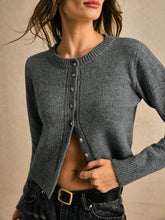 Short cardigan with ribbed edges and button placket