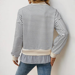 Black and white striped sweatshirt with beige details