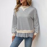 Black and white striped sweatshirt with beige details