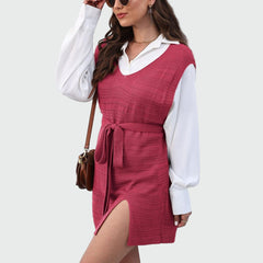 Sleeveless knitted dress with belt and front slit