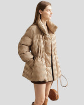 Quilted jacket with structure, high collar and drawstring at the waist