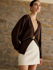 Cardigan with sculpted button and v-neck