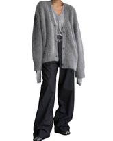 Oversized cardigan with buttons and long sleeves