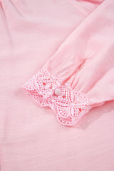 Pink shirt with lace trim and gathered sleeves