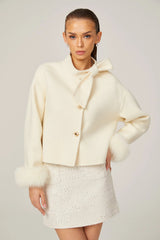 Cream short jacket with bow collar and fluffy cuffs