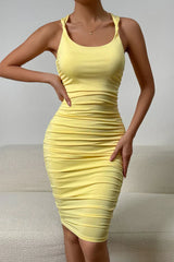 Yellow bodycon dress with crossed straps
