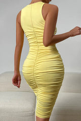 Yellow bodycon dress with crossed straps