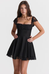 Black mini dress with lace trim