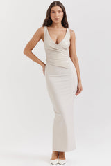 Cream-colored sleeveless wrap maxi dress with v-neck