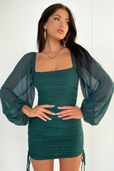 Green dress with transparent sleeves