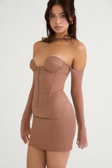 Miniklänning i mocka med strukturerad korsett