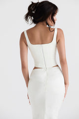 Lång korsett i elfenbensfärgad satin med utskuren lång kjol