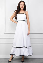 Long white dress with black trim