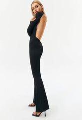 Svart jumpsuit med låg ärm och öppen rygg