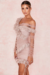 Miniklänning med volanger och transparent ärm