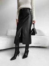 Black leather dress with front slit