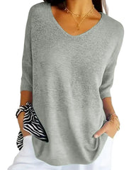 Knitted sweater with v-neck