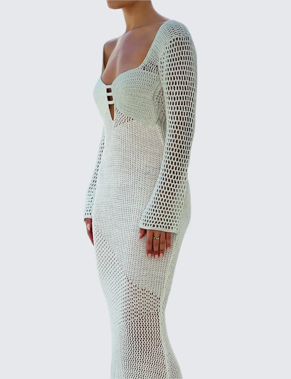 Lyxig vitstickad långklänning