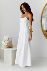 White long dress with narrow straps and hollow-out details