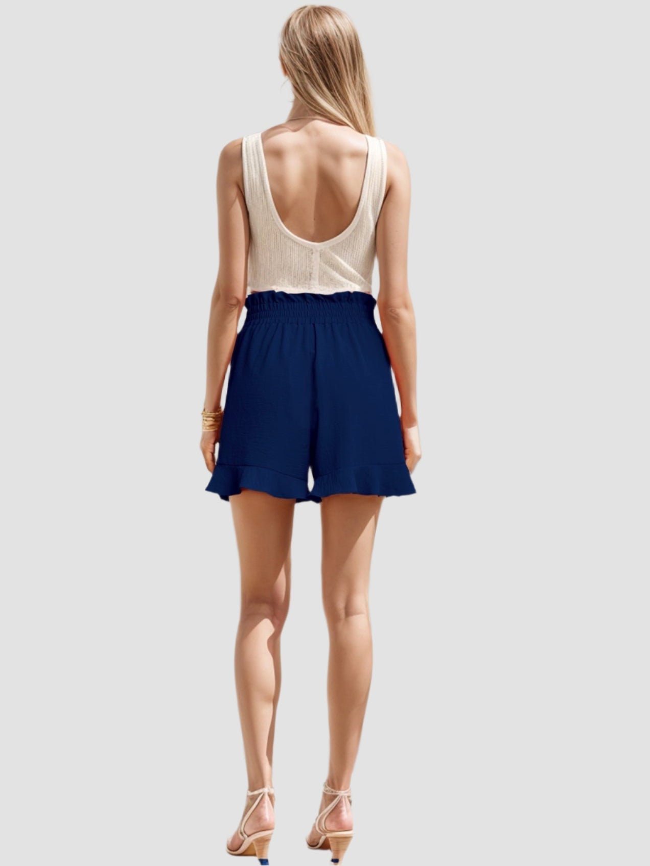 Pleated shorts with tie belt