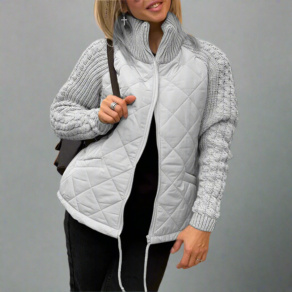 Varm vadderad jacka med stickade ärmar