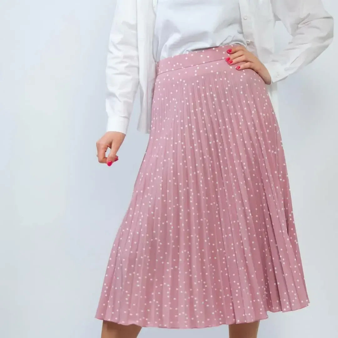 Pink pleated skirt with white polka dots
