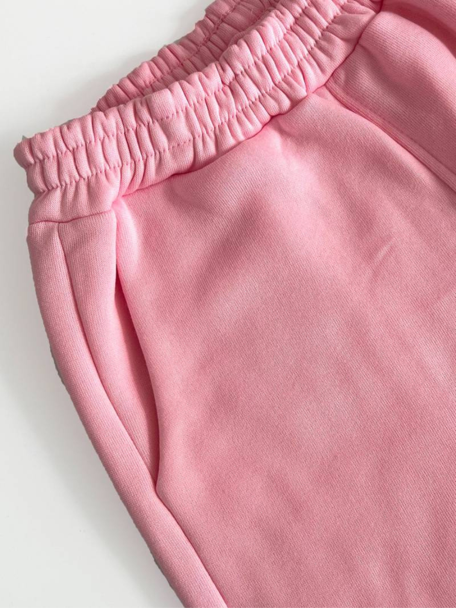 Blus med dragkedja och träningsoverallsbyxa