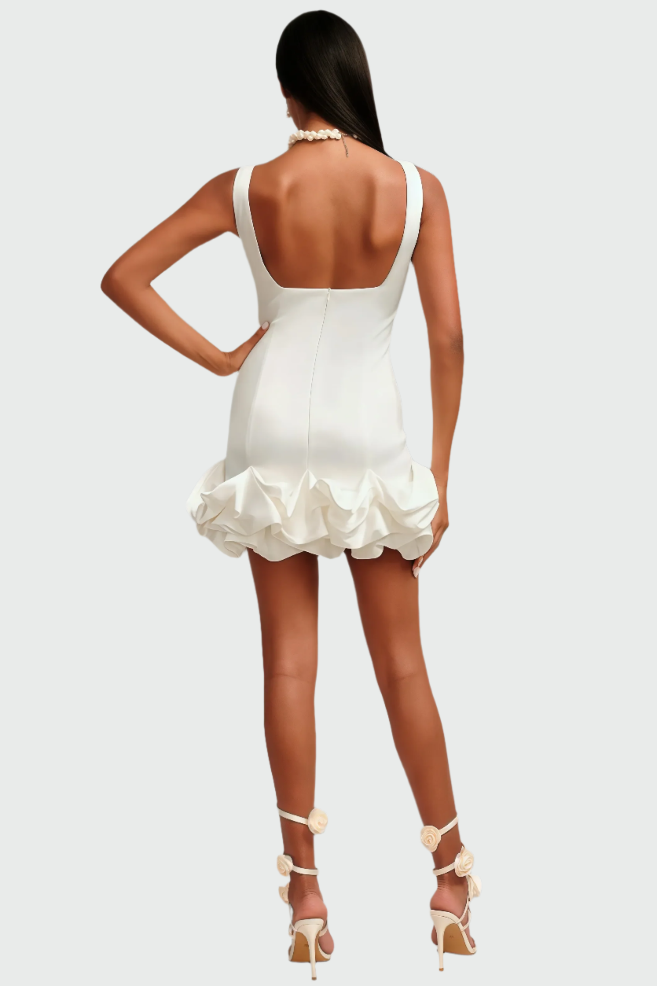 White mini dress with ruffled skirt