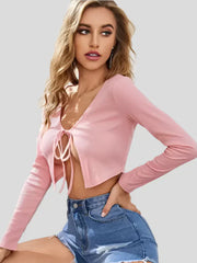 Pink long sleeve crop top with front tie