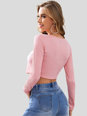 Pink long sleeve crop top with front tie