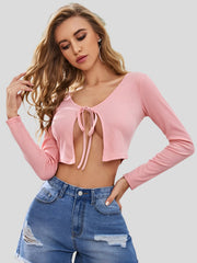 Pink long sleeve crop top with front tie