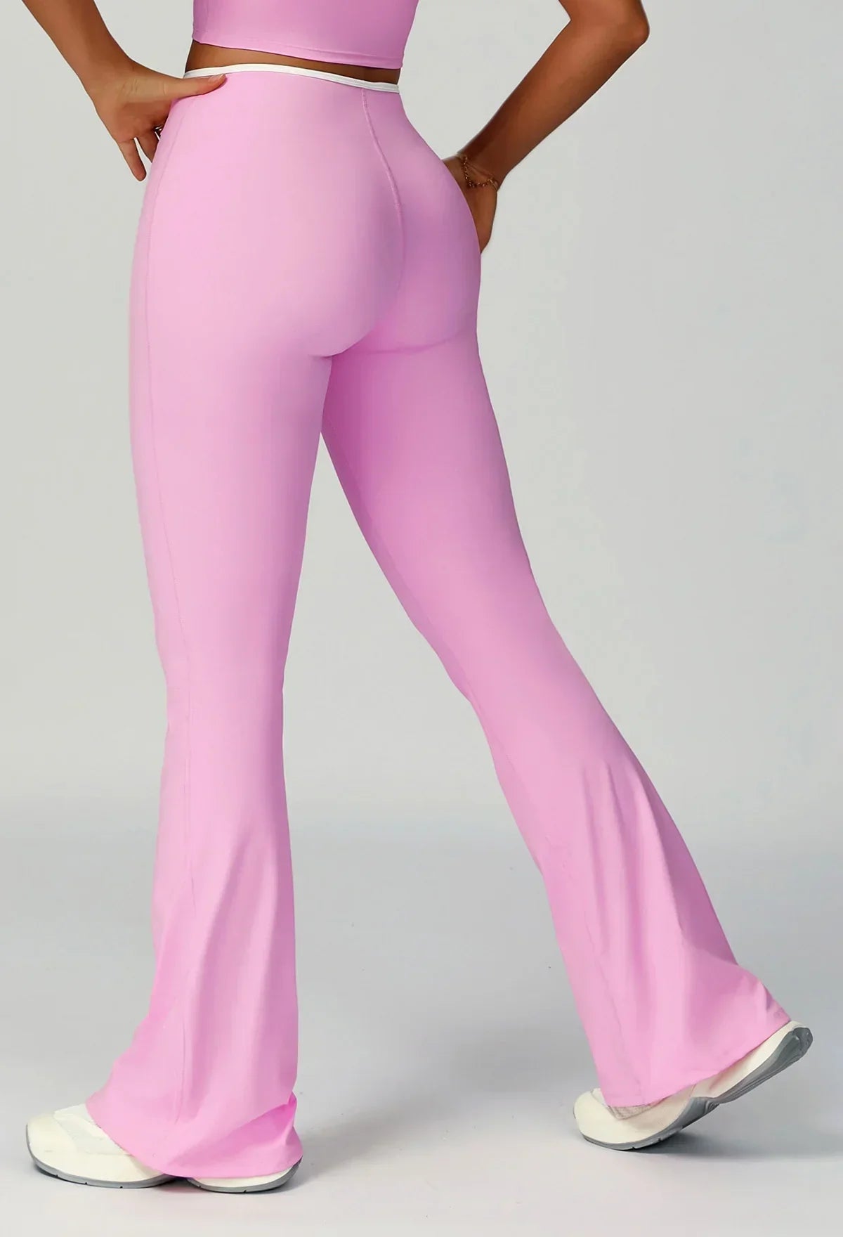 Sporty flared pants with bow detail