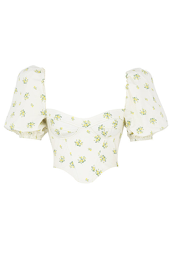 Elfenbensfärgad korsett med blommor och puffärmar