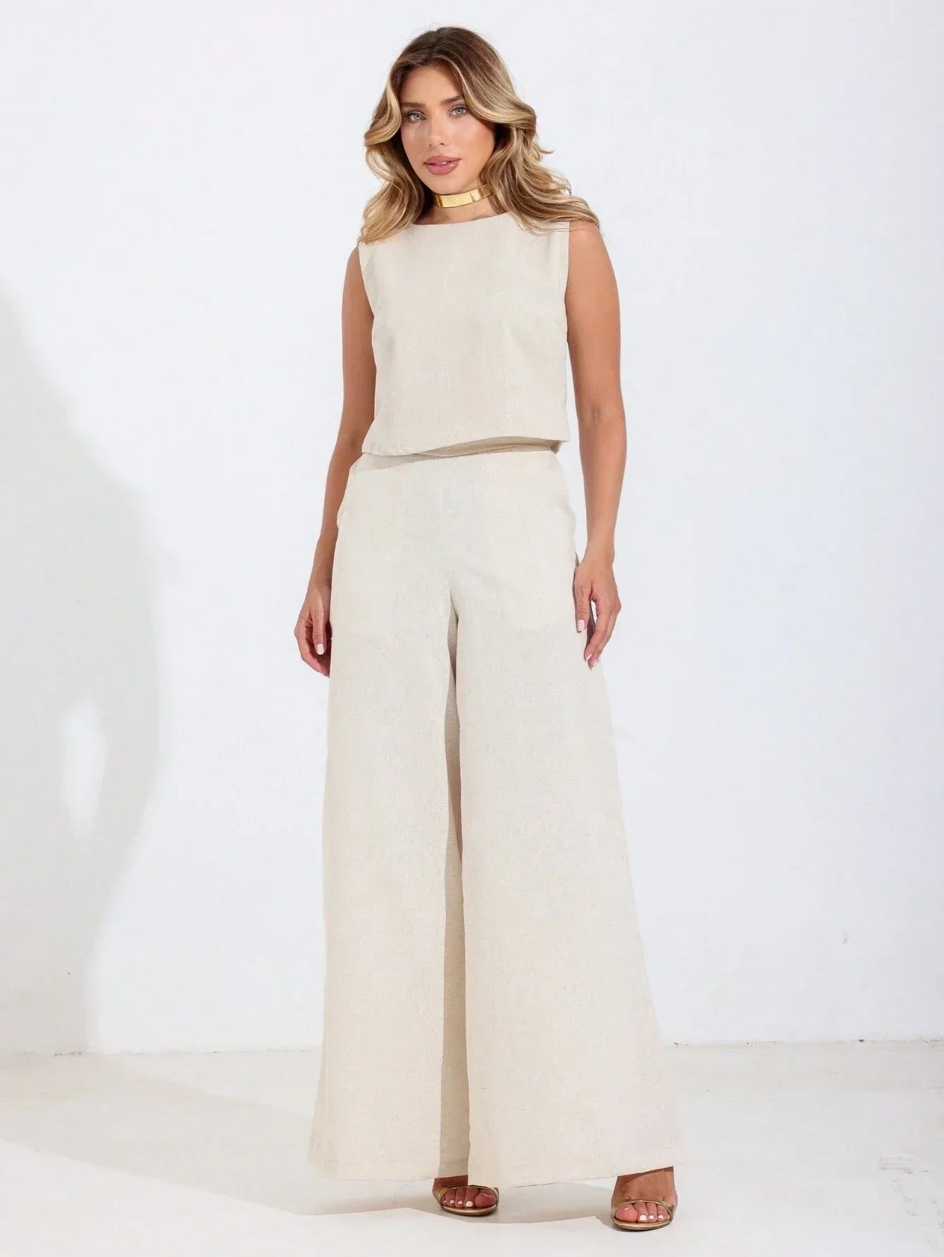Sleeveless crop top and wide leg pants set
