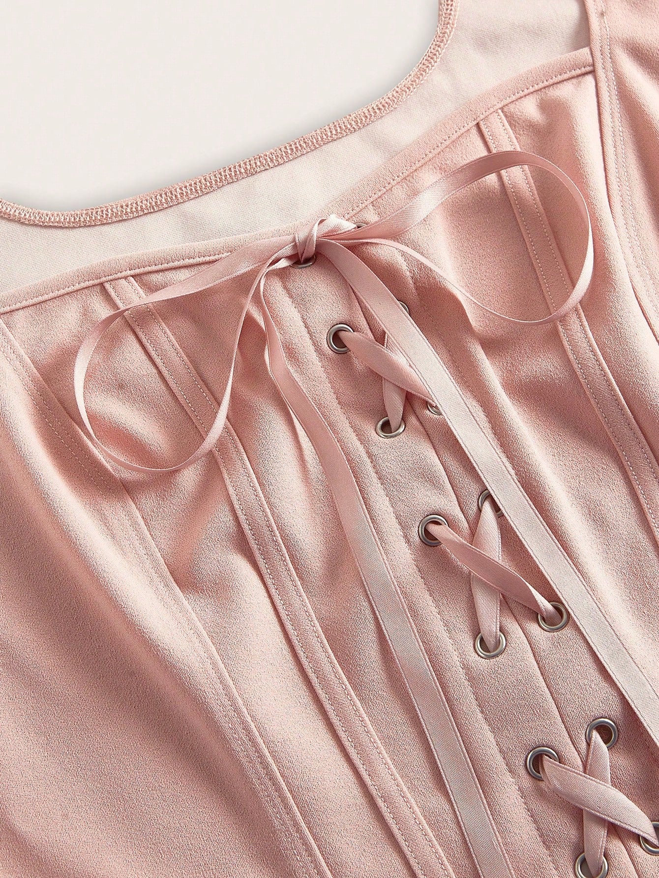 Lace-up top with fitted cut