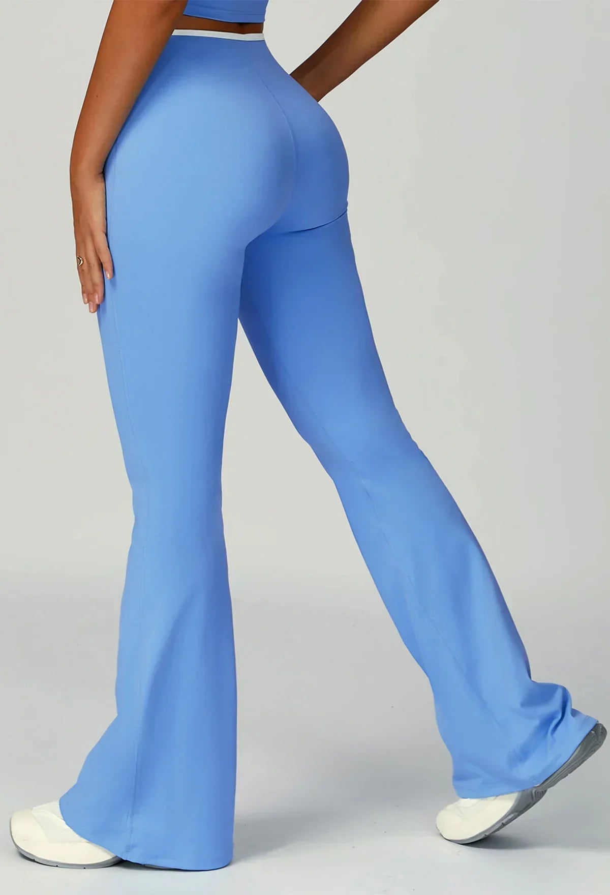 Sporty flared pants with bow detail