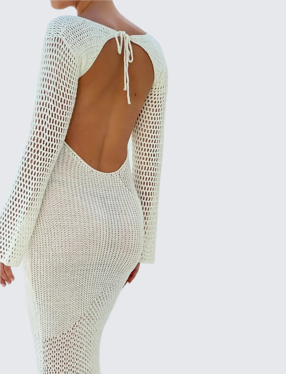 Lyxig vitstickad långklänning