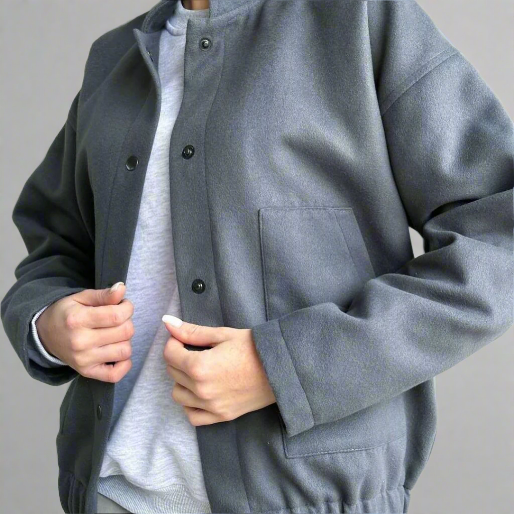 Jacka med ståkrage kappa