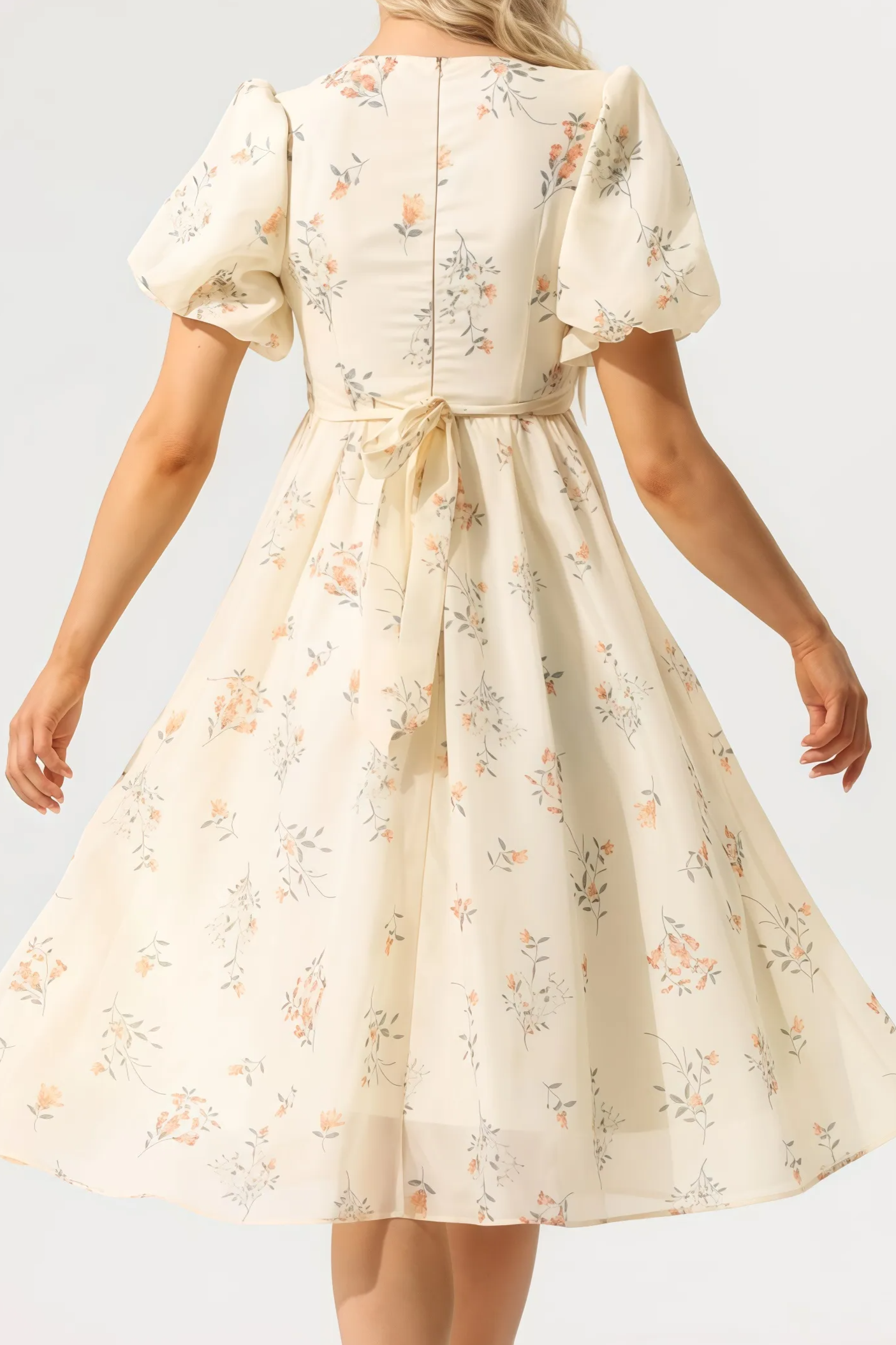 Cream-colored floral midi dress with ruched top