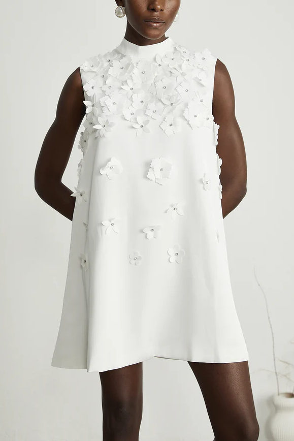 White sleeveless dress with 3D flowers