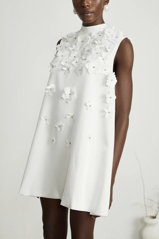 White sleeveless dress with 3D flowers