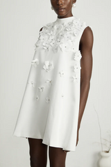 White sleeveless dress with 3D flowers