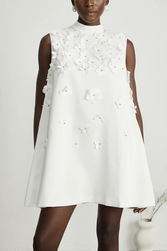 White sleeveless dress with 3D flowers