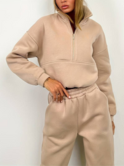 Blus med dragkedja och träningsoverallsbyxa