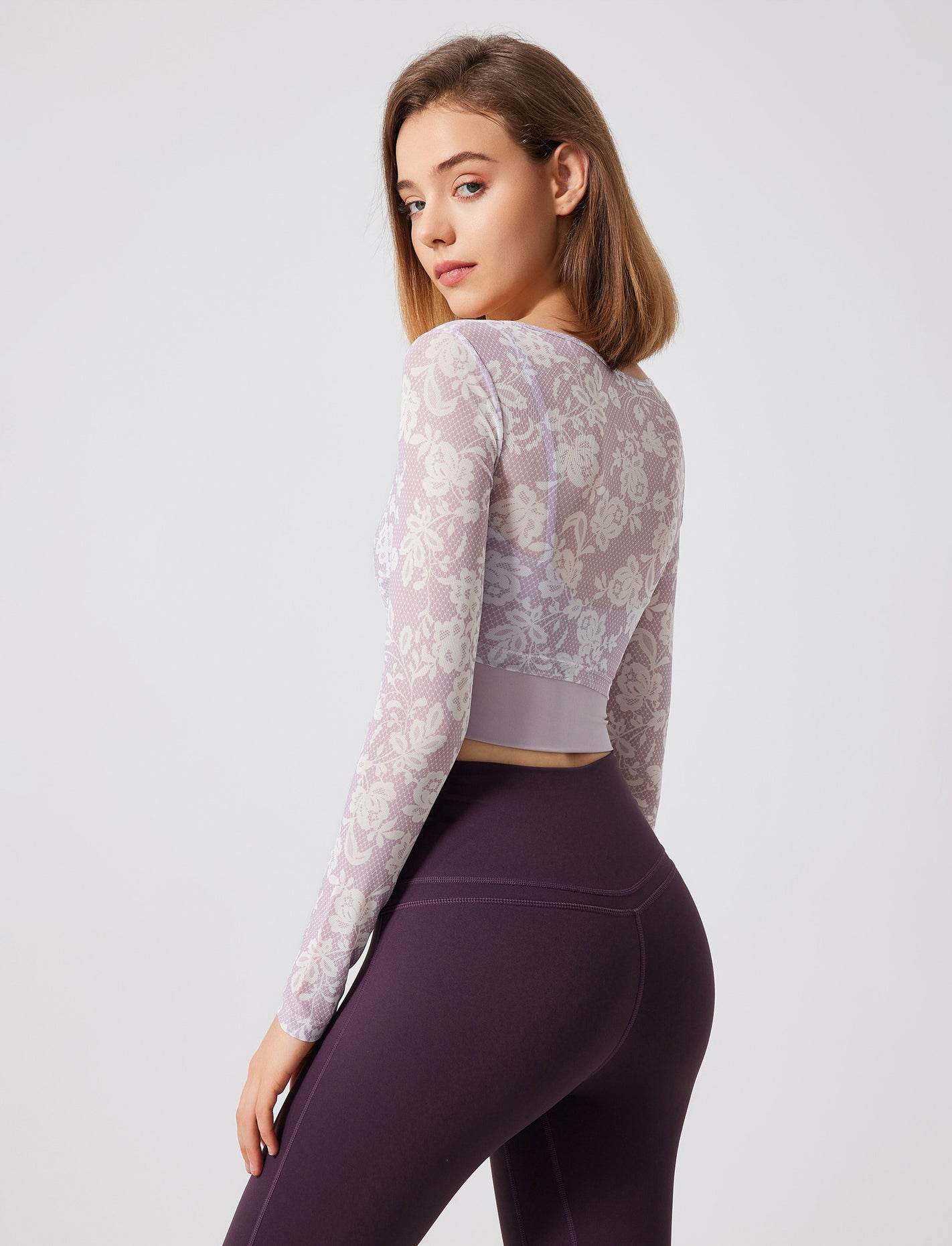 Floral patterned crop top with mesh sleeves