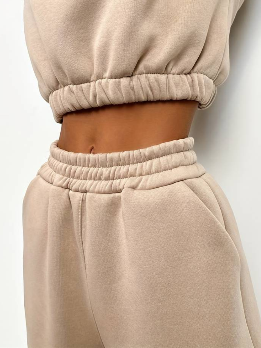 Blus med dragkedja och träningsoverallsbyxa