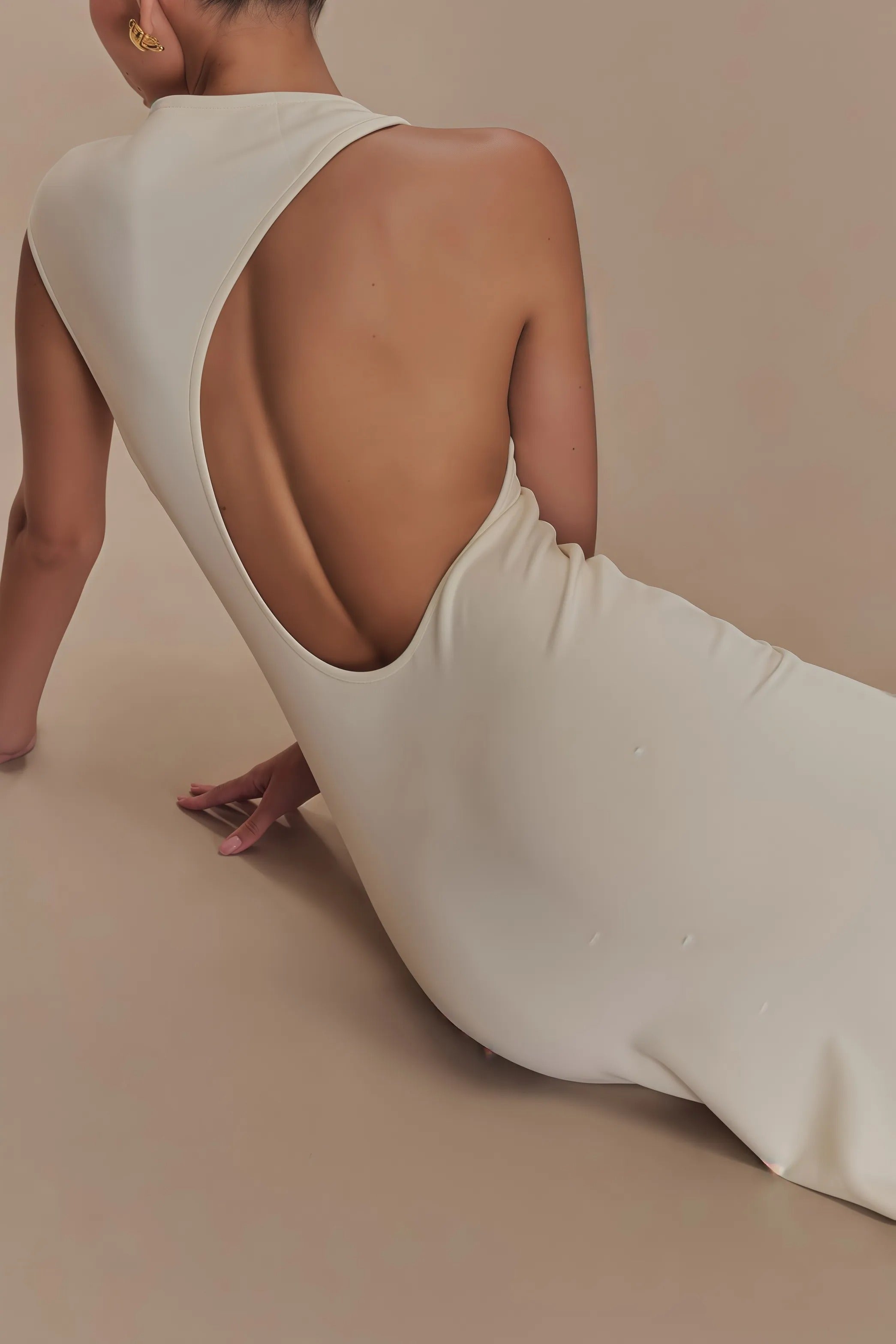 Cream sleeveless maxi dress with high neck